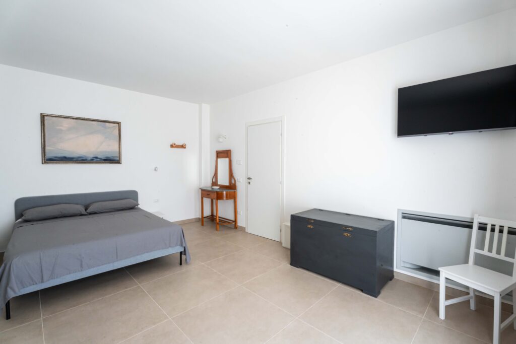 Villa Magliese giardino PISCINA GESTRUEMIA PRATO ARANCI VASI PIETRA salento vacanze vacations italy italia puglia pool garden maglie vacation house bedroom