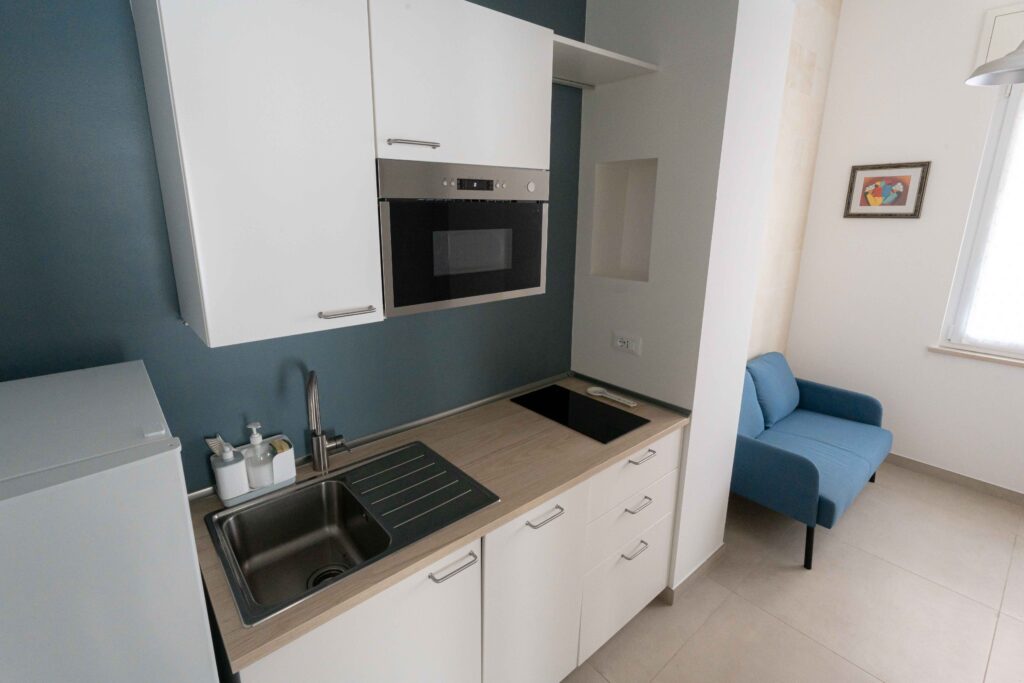 Villa Magliese giardino PISCINA GESTRUEMIA PRATO ARANCI VASI PIETRA salento vacanze vacations italy italia puglia pool garden maglie vacation house Kitchen